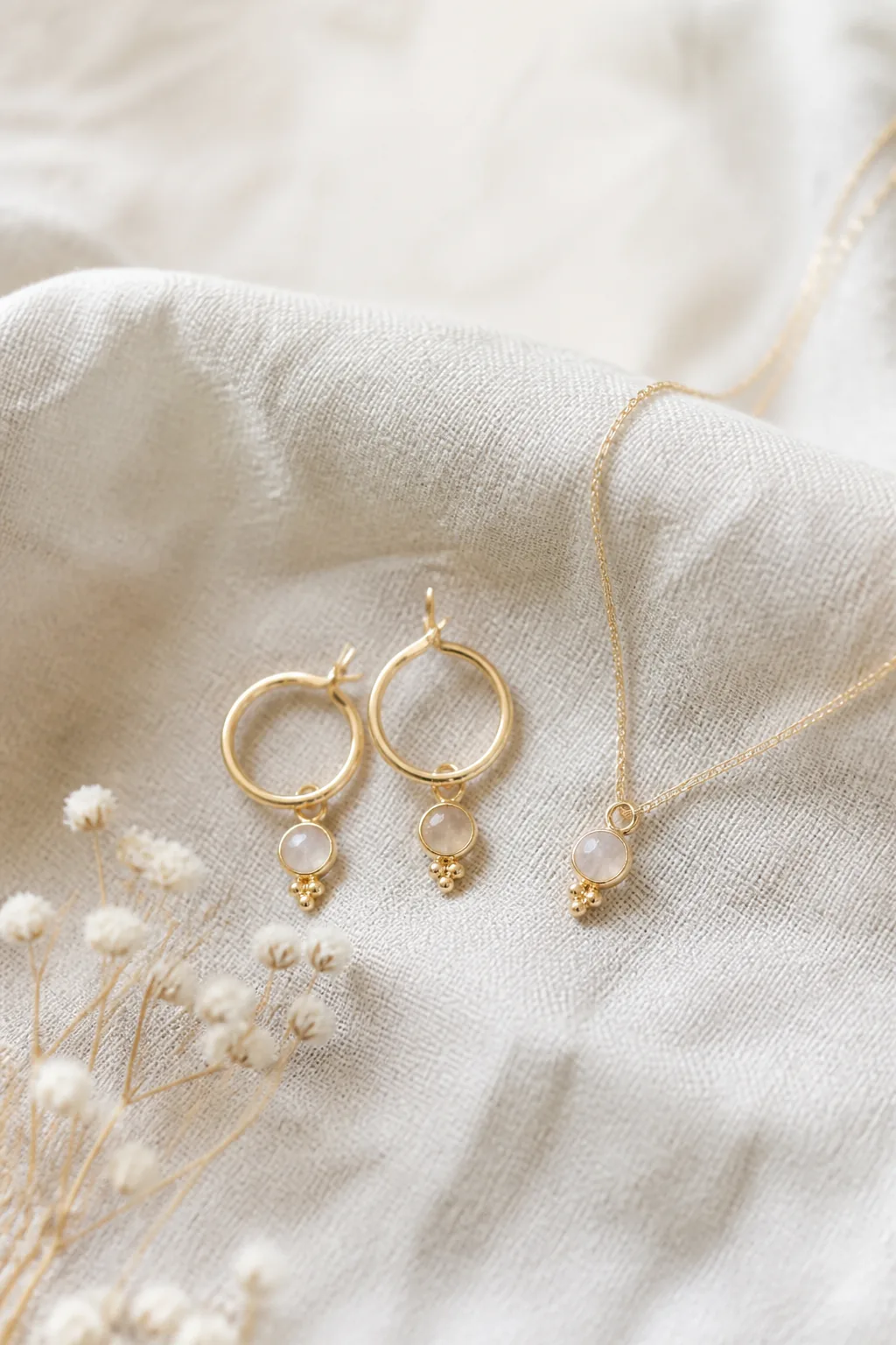 Handmade gold jewelry on linen